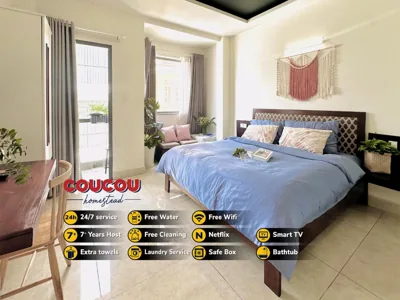 King Room with Balcony — CouCou Homestead II - Mini Hotel District 1